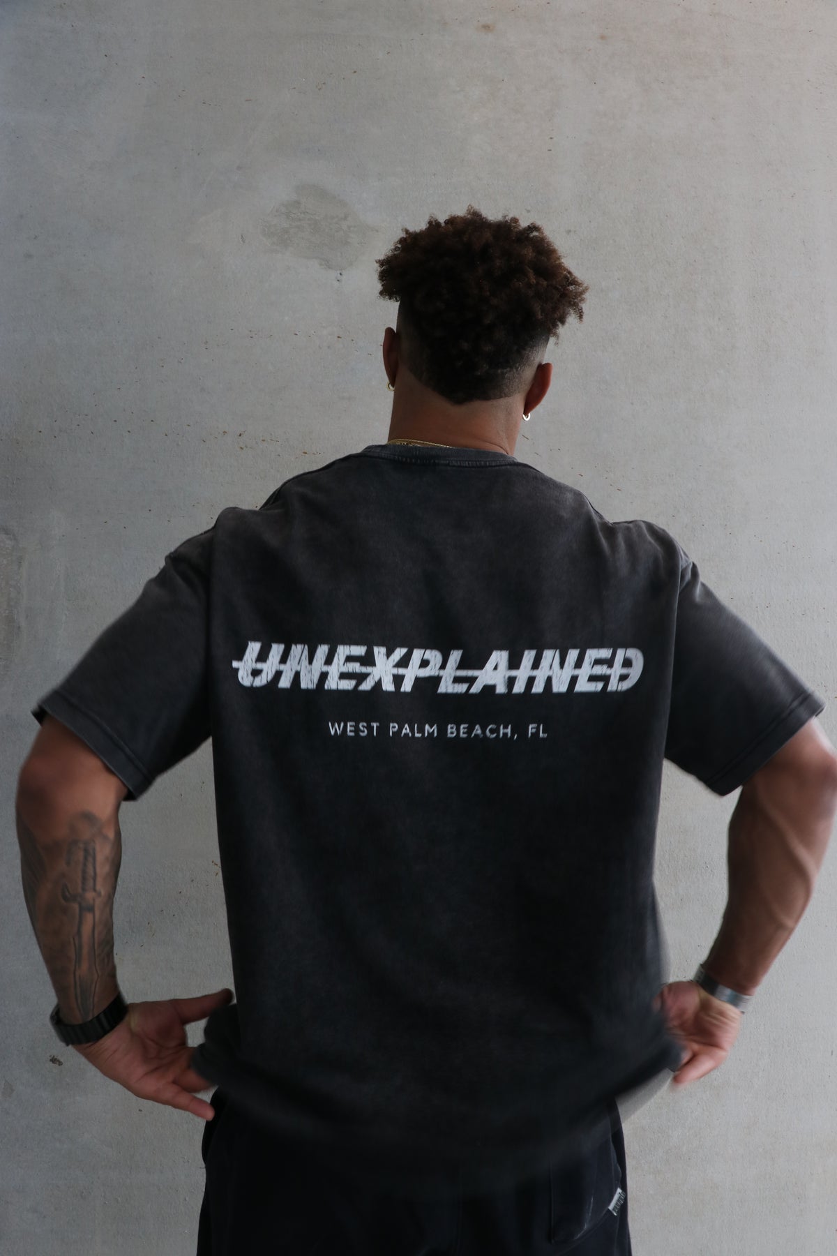 branded unexplained tee