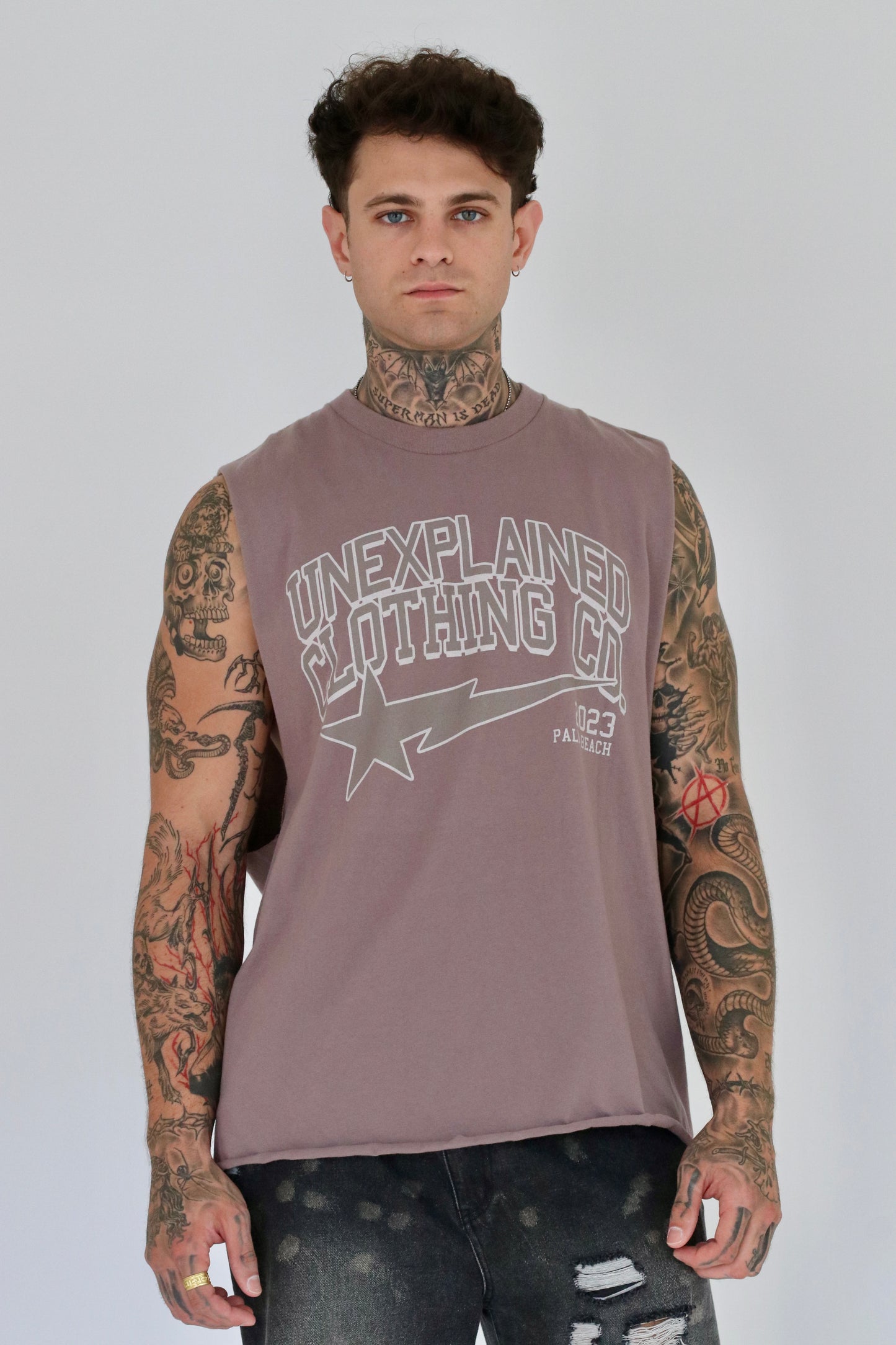 UNEXPLAINED CLOTHING CO CUT OFF