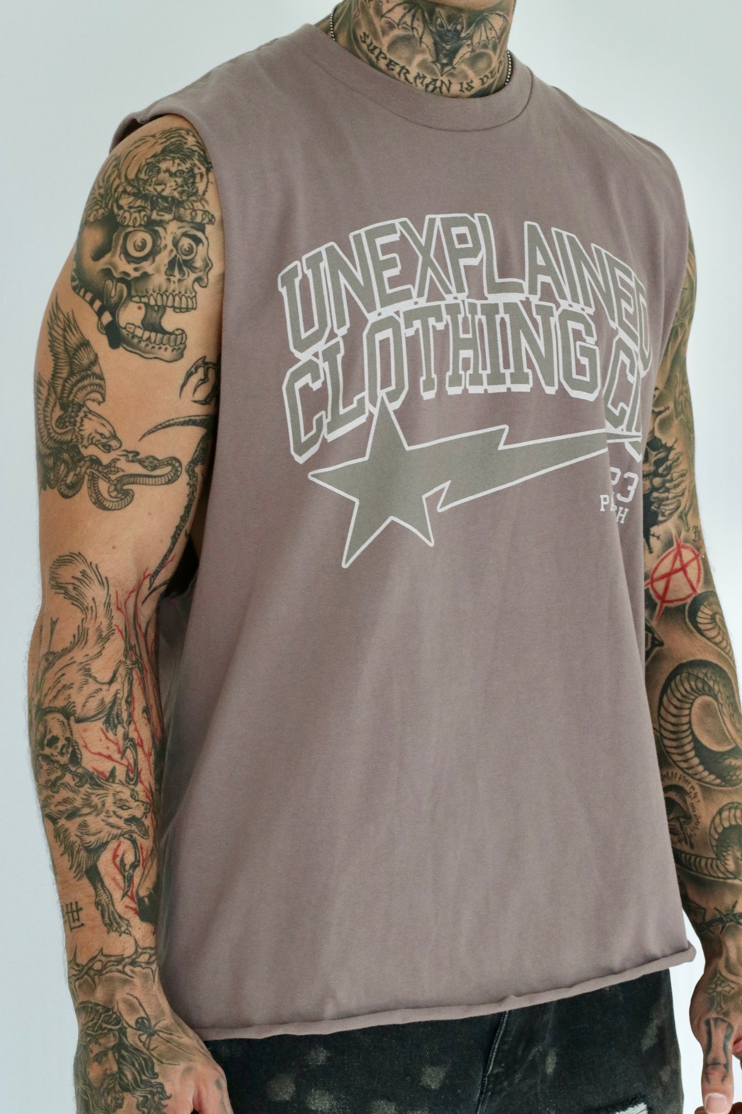 UNEXPLAINED CLOTHING CO CUT OFF