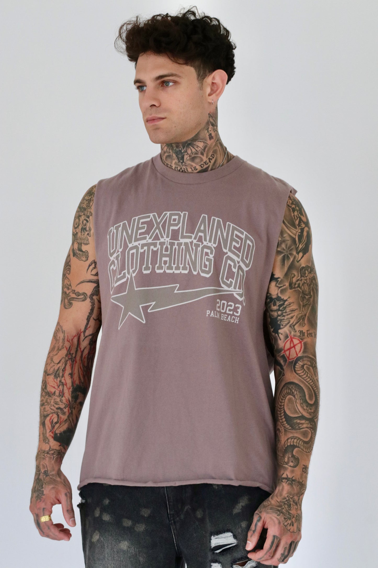 UNEXPLAINED CLOTHING CO CUT OFF