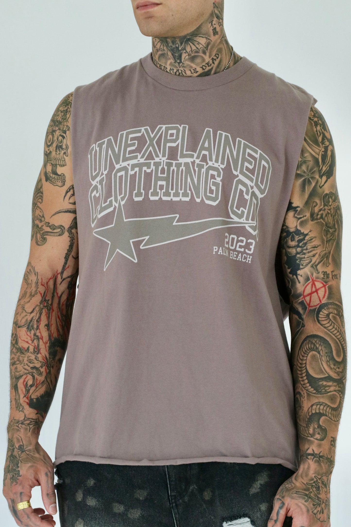 UNEXPLAINED CLOTHING CO CUT OFF