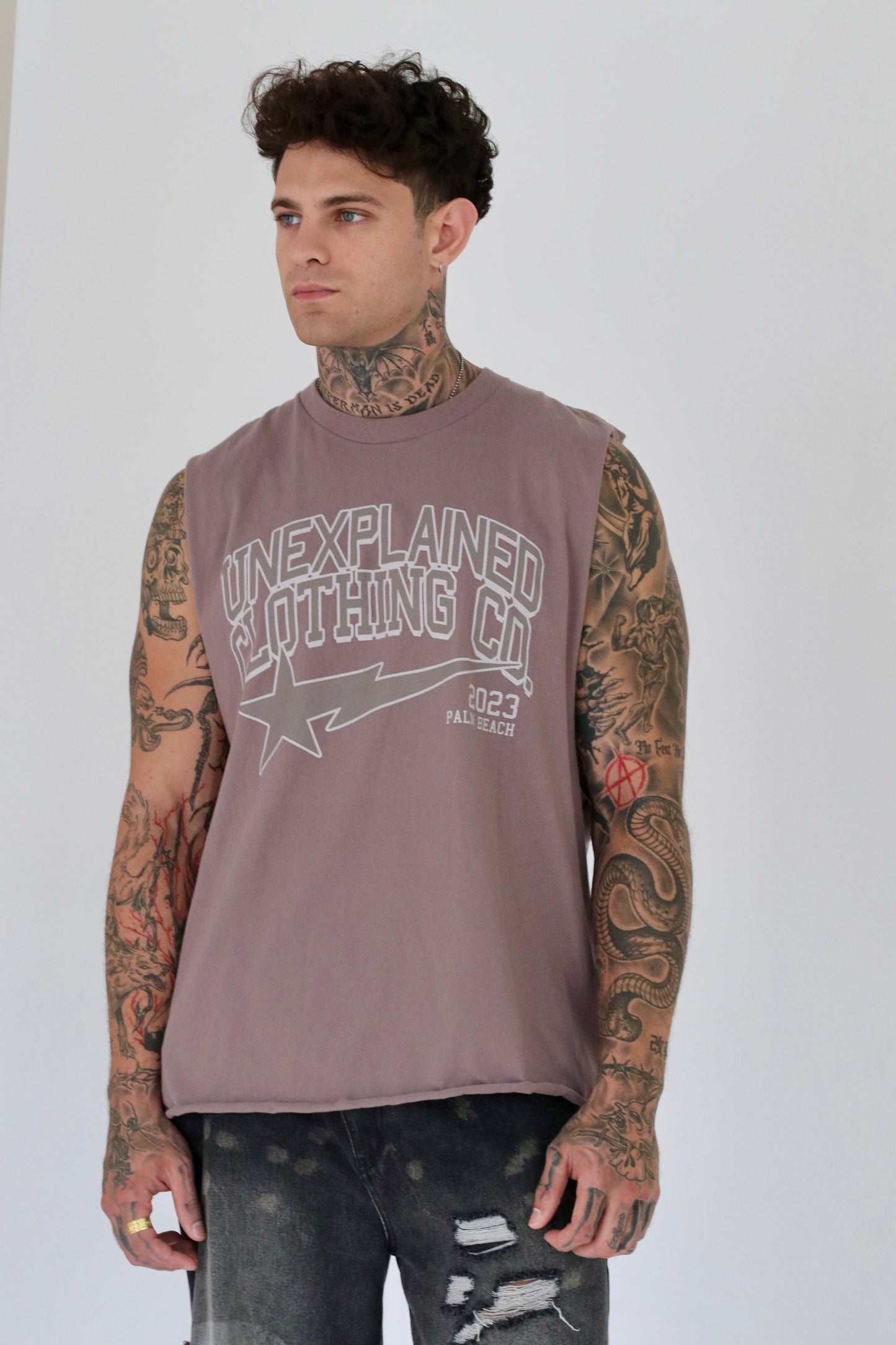 UNEXPLAINED CLOTHING CO CUT OFF