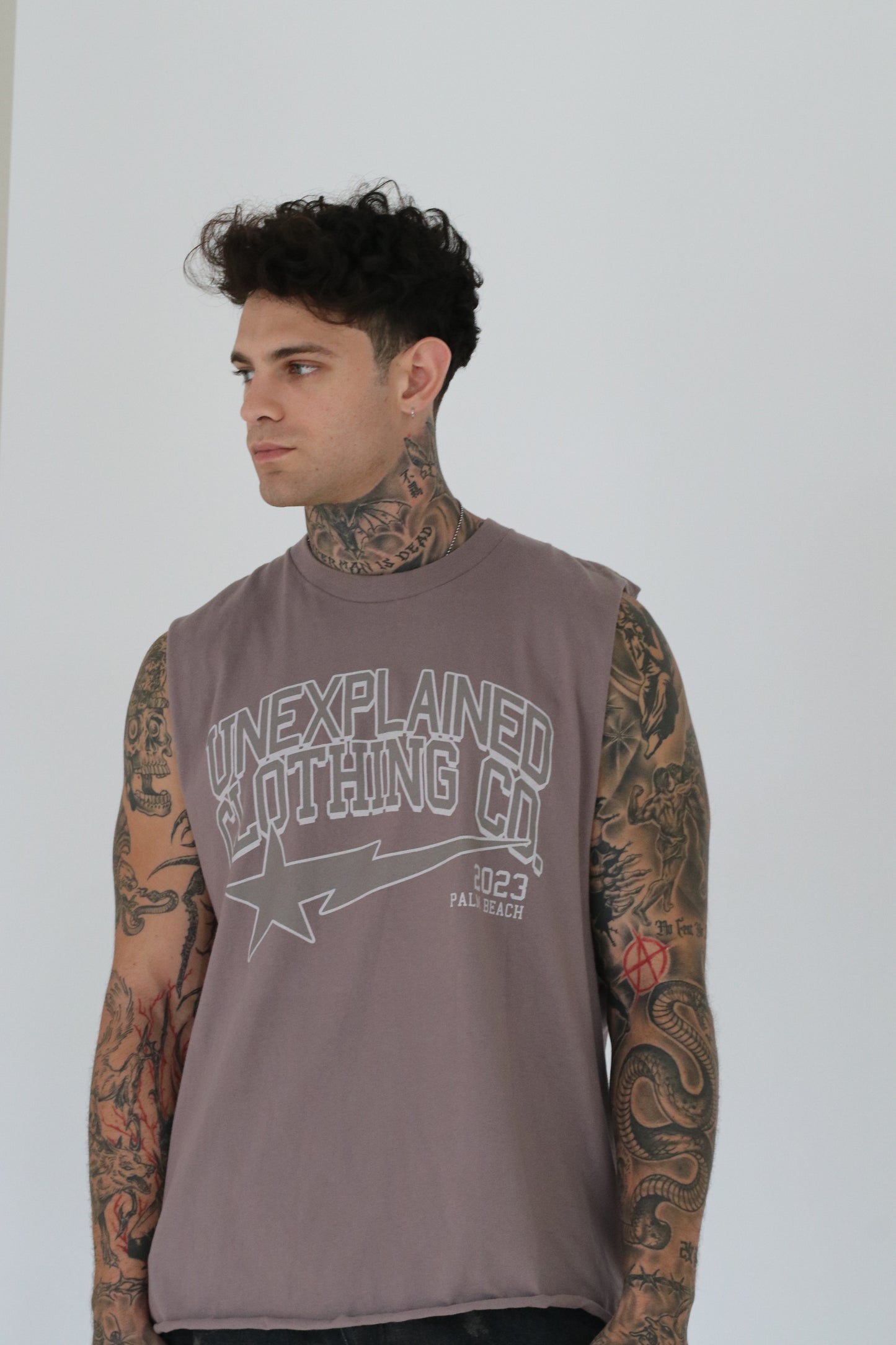 UNEXPLAINED CLOTHING CO CUT OFF