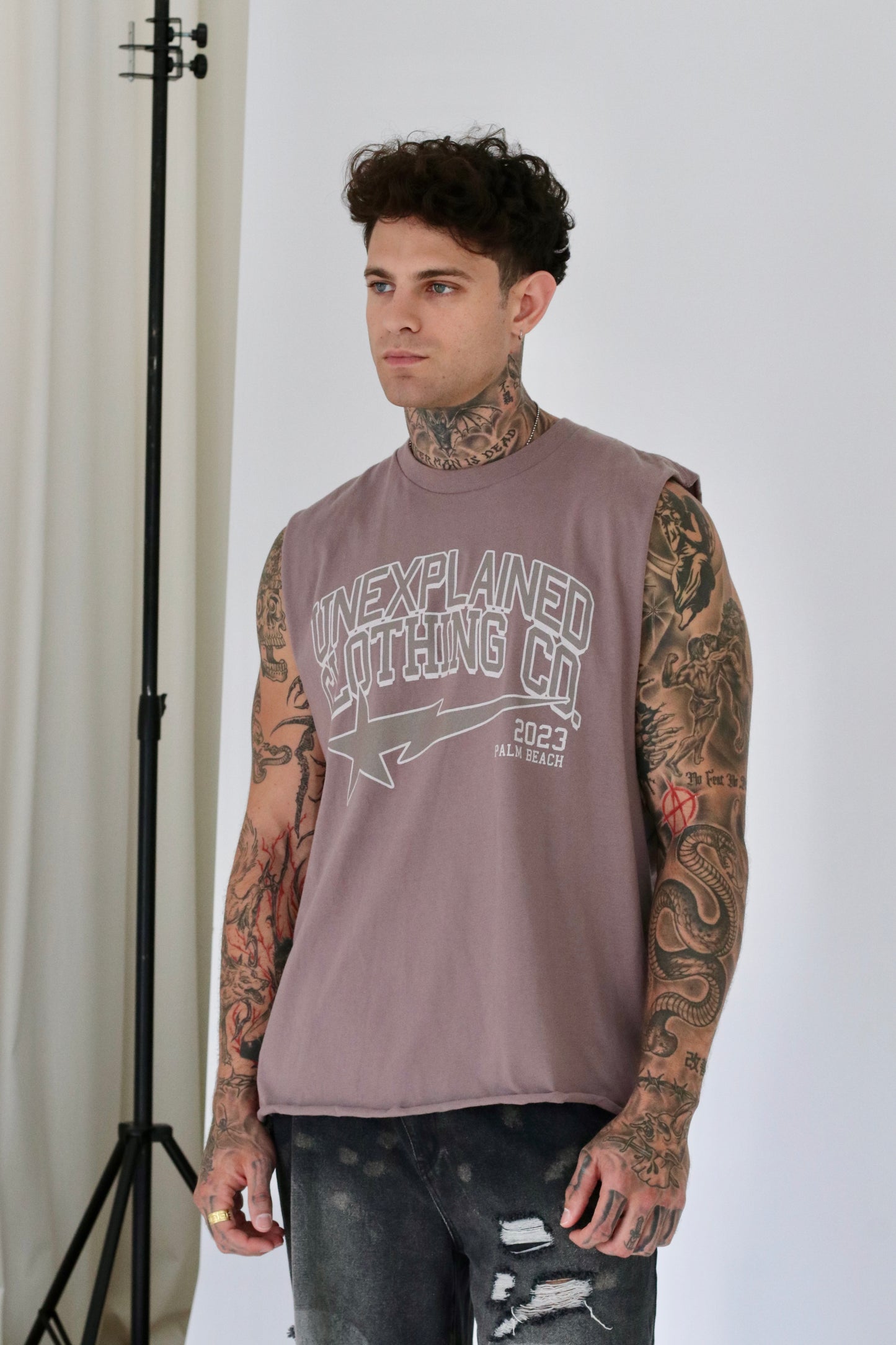 UNEXPLAINED CLOTHING CO CUT OFF